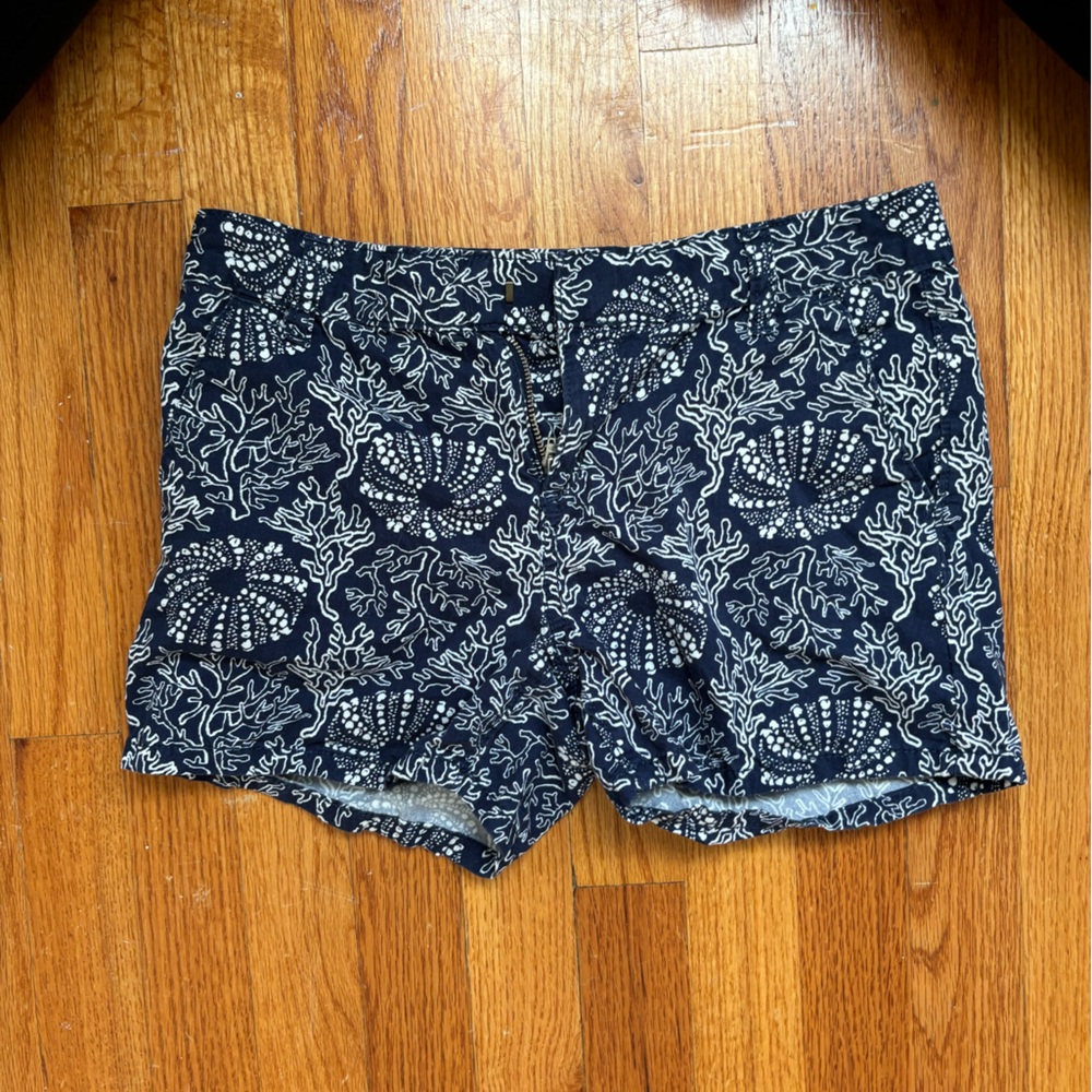Old navy blue shorts with white ocean details